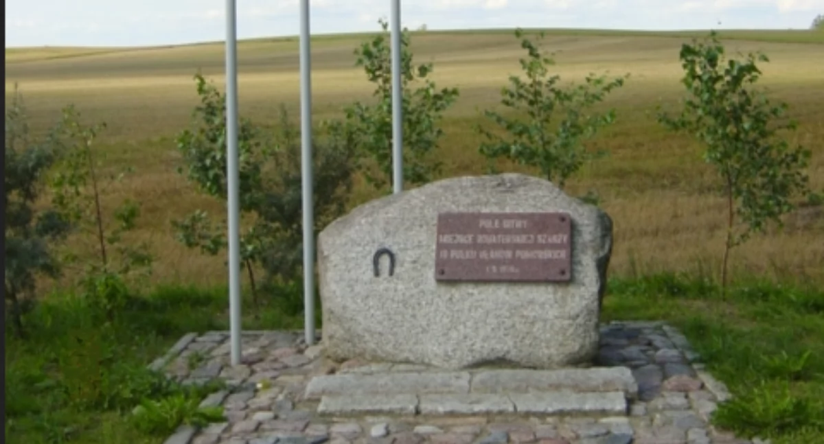 Pòmnik kòl pòla pòbitwë pòd Krojantama. Òdj. Spetsedisa; zdrzódło: https://pl.wikipedia.org/wiki/Bitwa_pod_Krojantami#/media/Plik:Battlefield_Krojanty_1.jpg